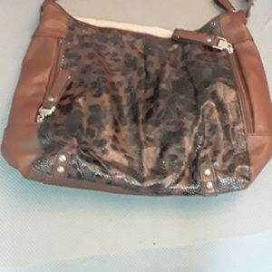 Leopard print leather purse.